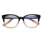 A pair of round full frame metal eyeglasses with pink and black color gradient.